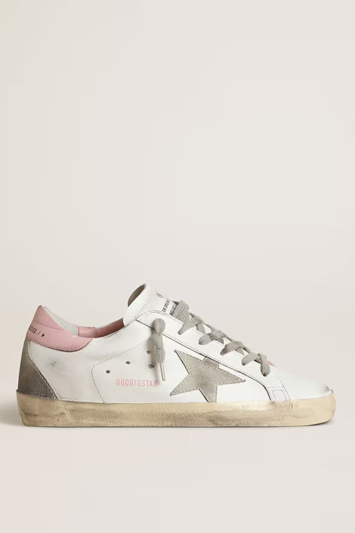 Super-Star pour femme avec étoile en daim gris et contrefort en cuir rose